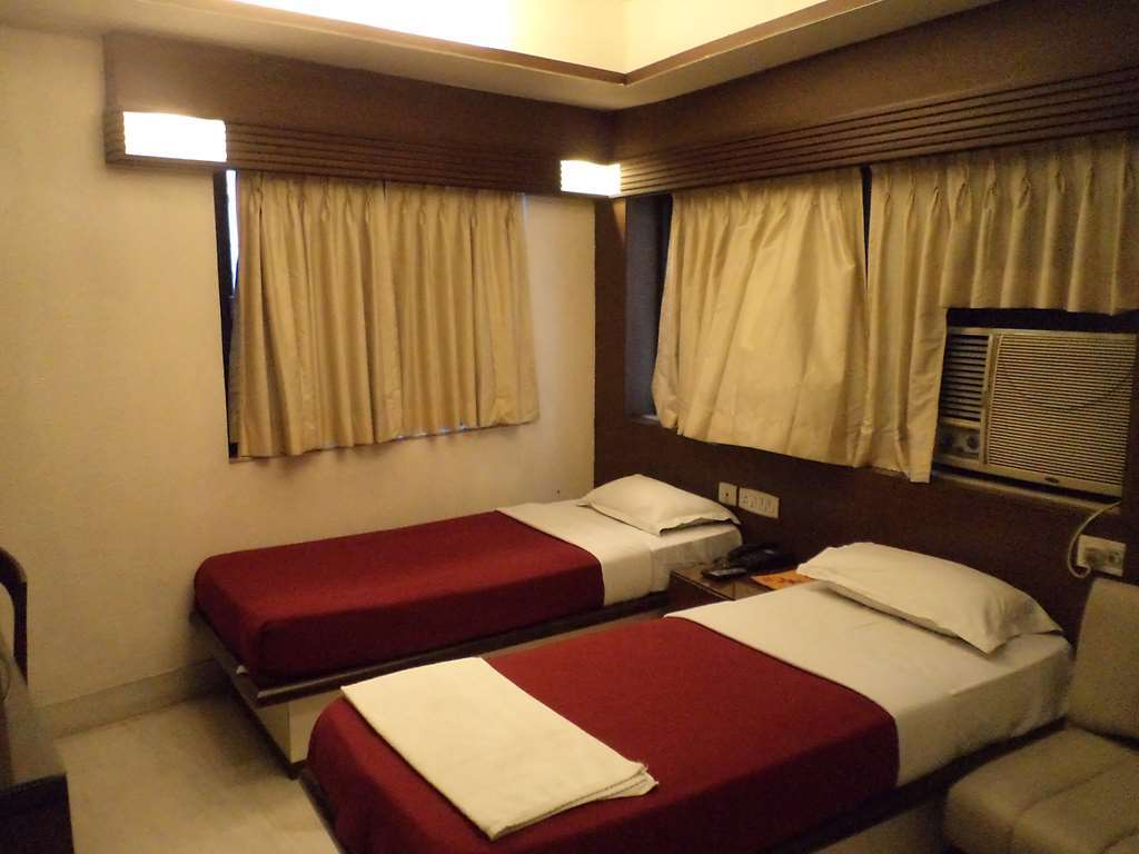 Hotel Aston Calcutta Rum bild